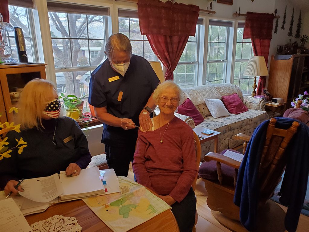 Guy Lamunyon vaccinating patient