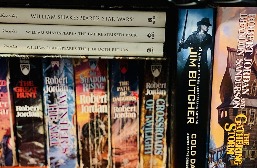 A stack of books on a bookshelf