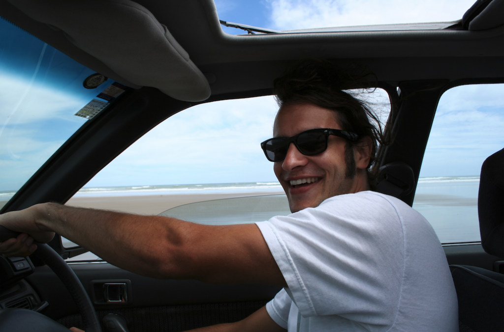 Jack Reid driving a car