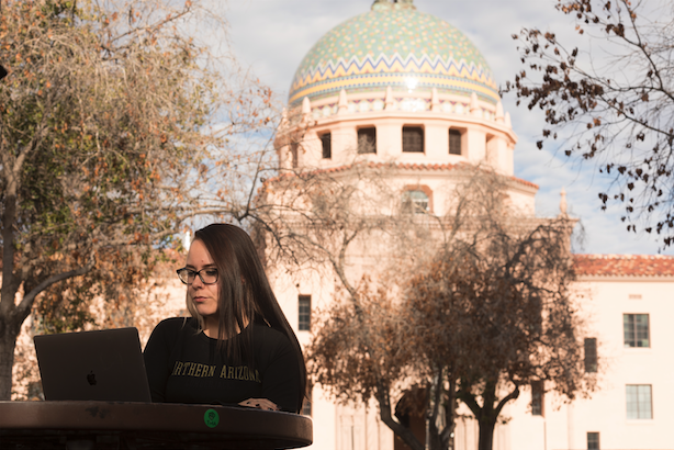 A student working on a laptop