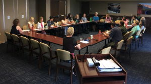 Staff sitting in a meeting