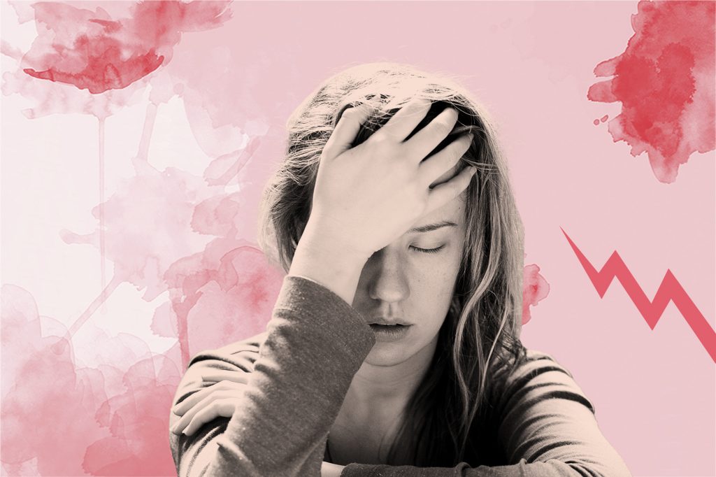 Woman grimacing in pain