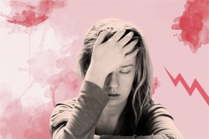 Woman grimacing in pain