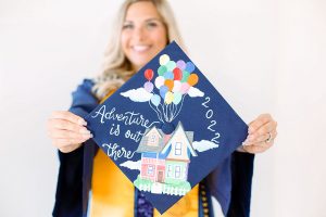 Raegan Liguori-Reid in a graduation gown and cap