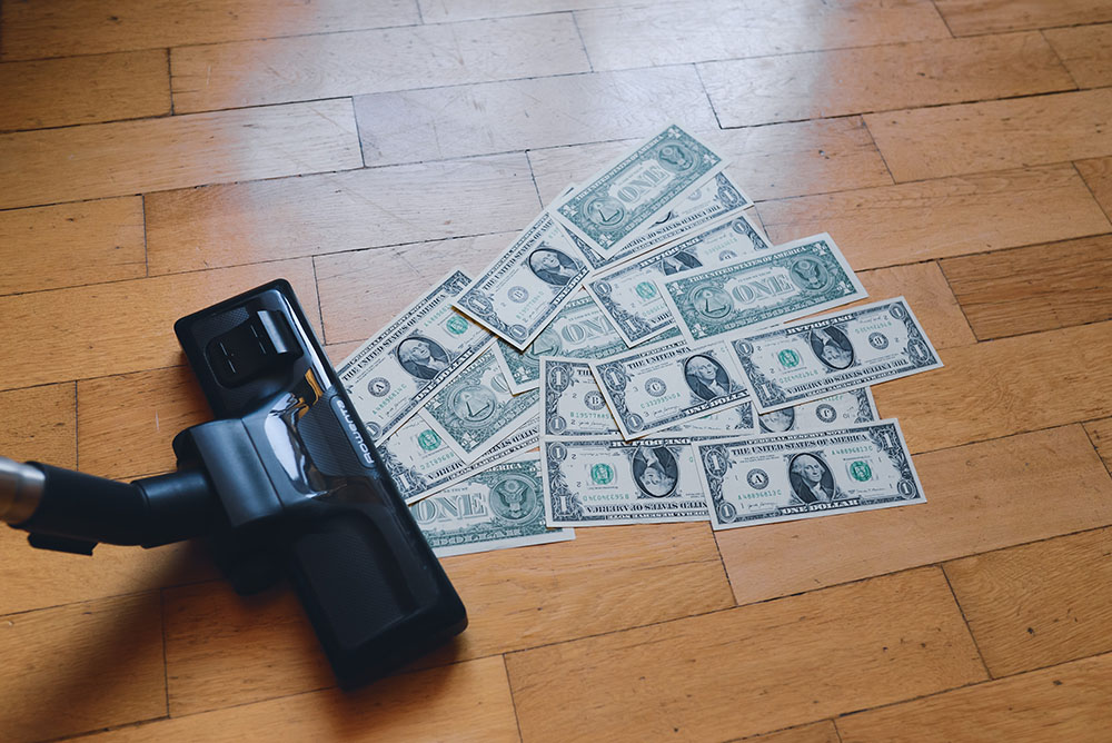 Vacuum sucking up money