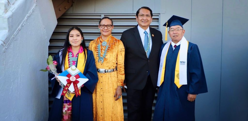 Kandice Tanner and her dad Kendal pose with President Nez