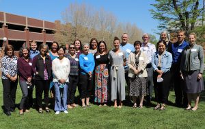 A group of researchers stand together in a group photo