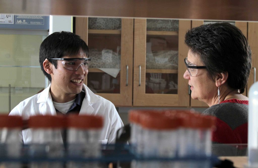 Jonathan Credo and Jani Ingram in a lab
