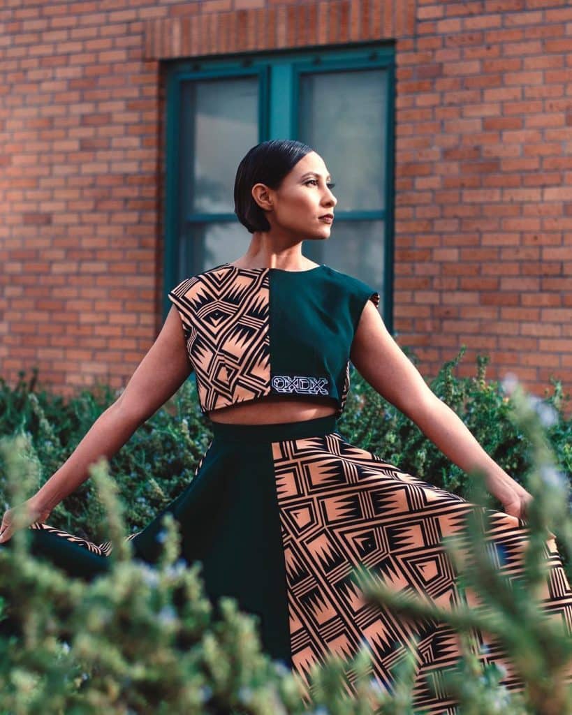 Monika Damron in an Indigenous fashion dress