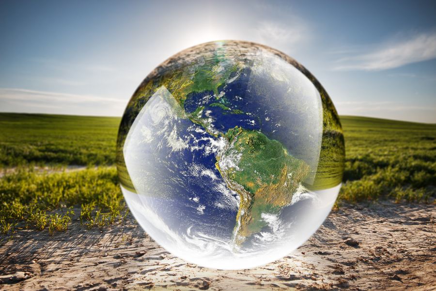 A globe with a field in the background