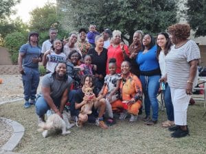 Keene with families he has helped