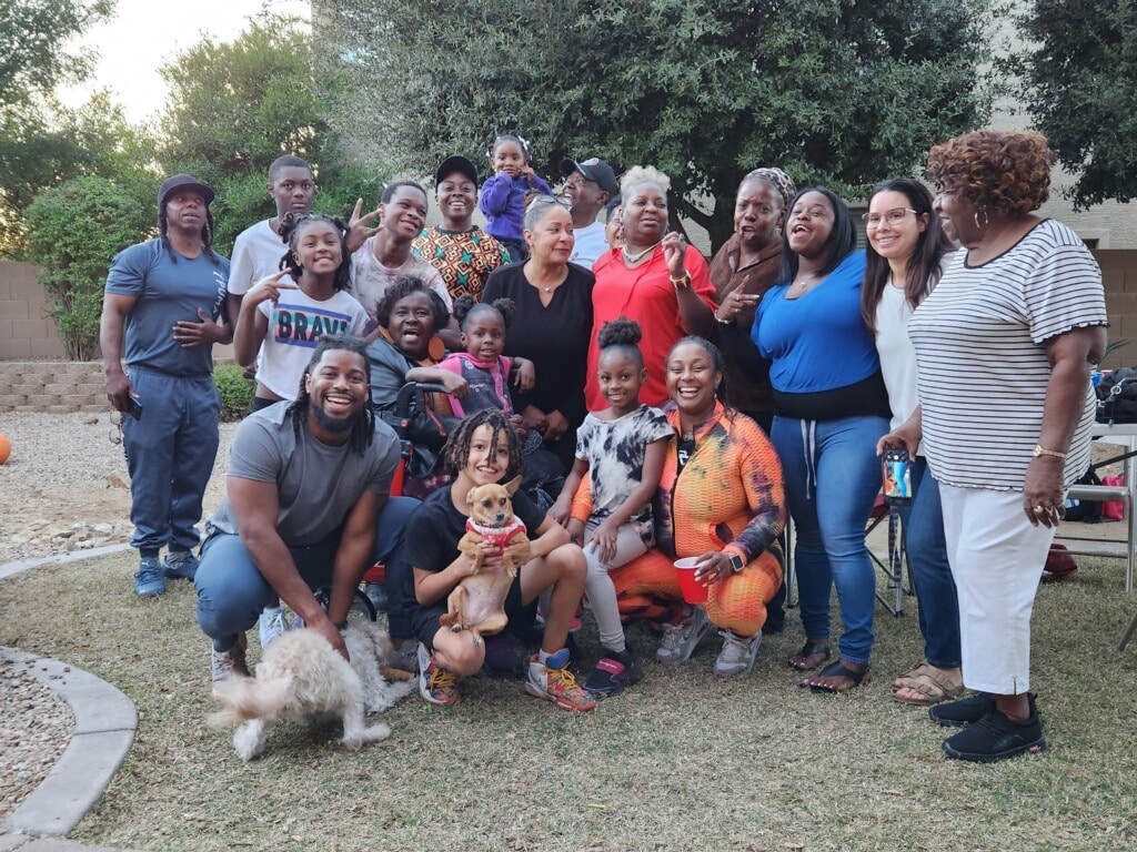 Keene with families he has helped