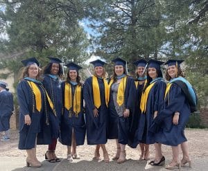 Brianne Kanu and her cohort in graduation gear