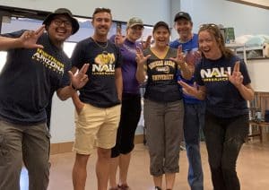 Six people in NAU gear doing LJs
