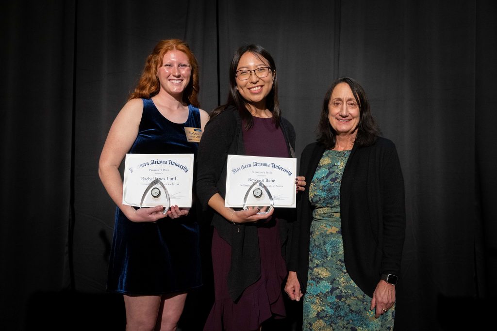 President's Prize winners Rachel Jones-Lord and Beyoncé Bahe with Provost Karen Pugliesi