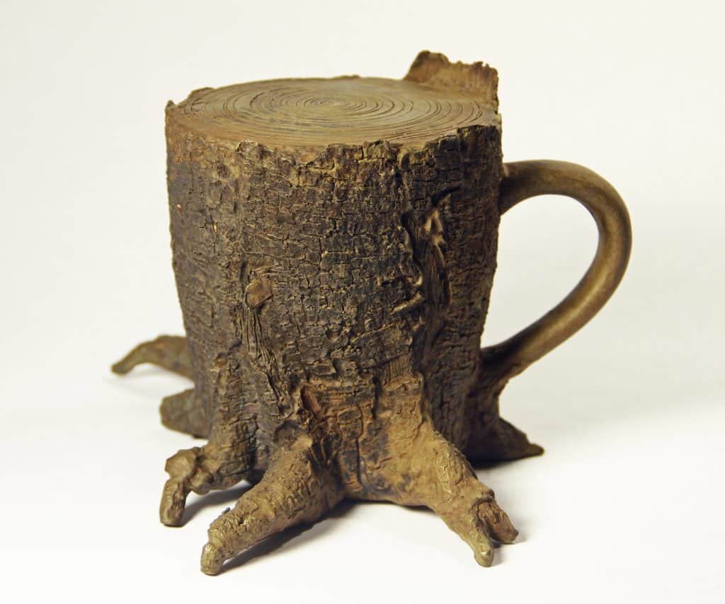 Neal Galloway, assistant teaching professor, who we are collaborating with. It's called "Best Part of Wakin Up Deforestation," and is "a bronze sculpture which explores the environmental and social consequences of industrial mono-culture coffee farming."