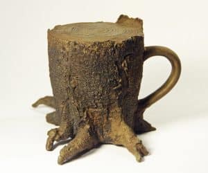 Neal Galloway, assistant teaching professor, who we are collaborating with. It's called "Best Part of Wakin Up Deforestation," and is "a bronze sculpture which explores the environmental and social consequences of industrial mono-culture coffee farming."