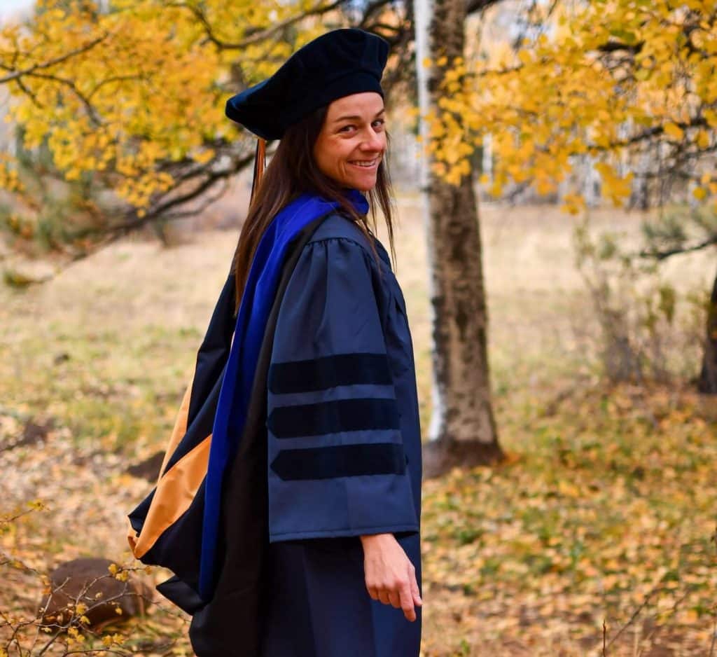 Bianca Trinkenreich wearing a doctoral cap and gown