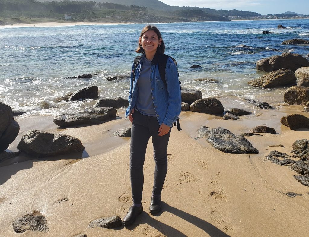 Andrea Lopez posing on a beach in Northern Spain