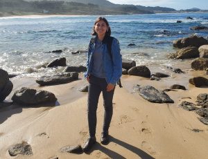Andrea Lopez posing on a beach in Northern Spain