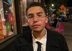 Lenin Salcedo on Aspen Street in Flagstaff wearing a suit