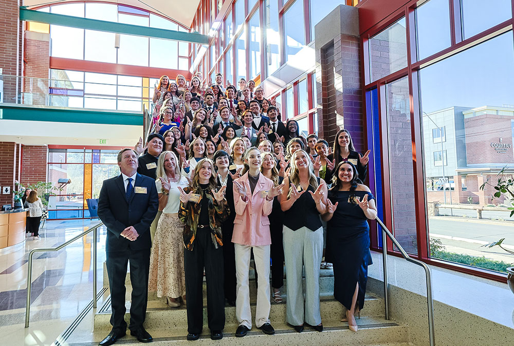 Distinguished Seniors and Gold Axe winners do LJs on steps at High Country Conference Center