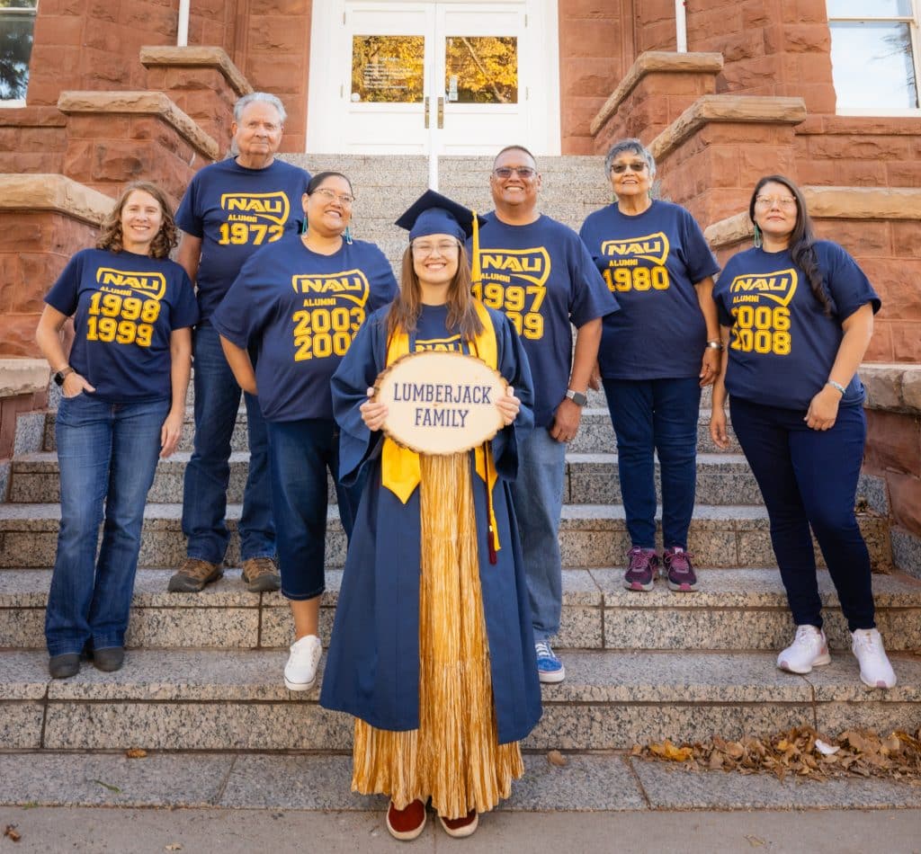 The Mitchell family in front of Old Main - NAU