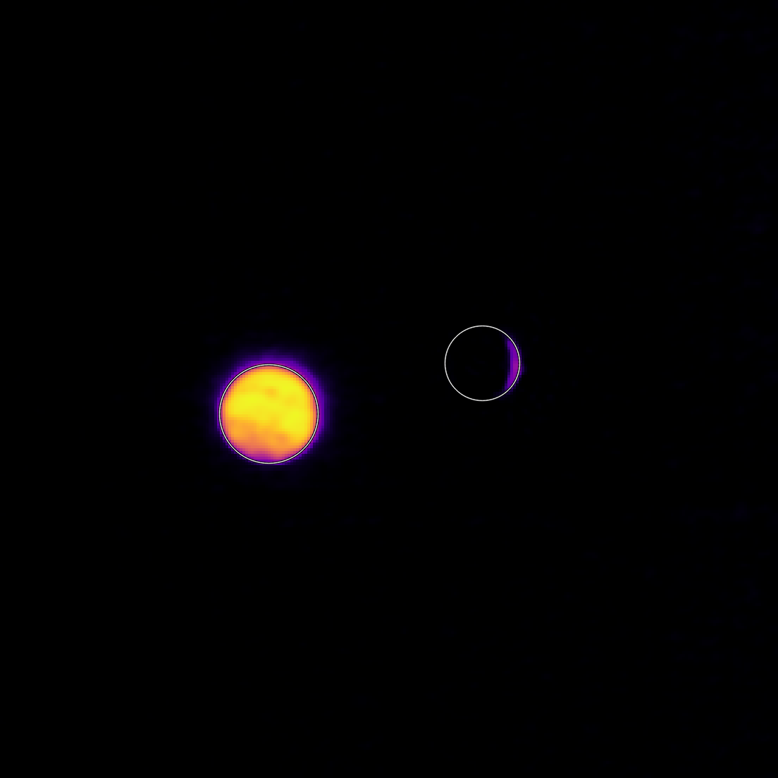 This infrared image shows emitted energy from Earth (left) and the Moon (right).