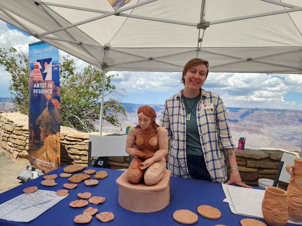 Rain Orchard at the Grand Canyon presenting her art