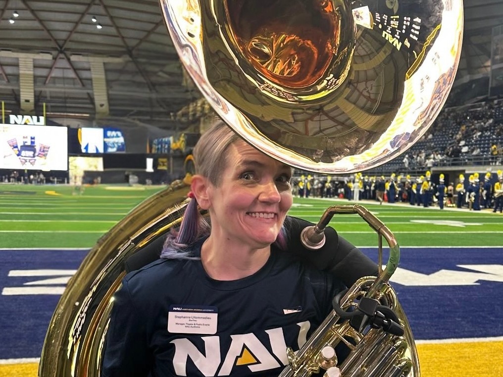 Stephanne LHommedieu playing the tuba in the Skydome.