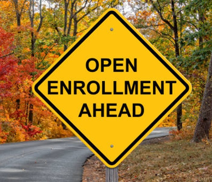 Open Enrollment Caution Sign Open Enrollment Caution Sign With Autumn Road Background
