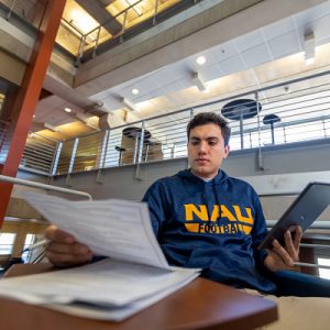 male student studying