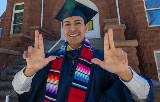 Student Graduate with Hispanic Convocation Stole