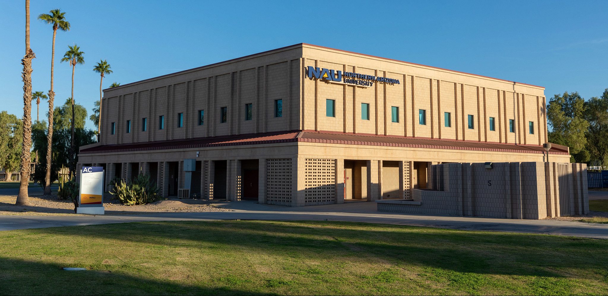 Yuma campus building with the sun hitting the side.